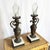 An elegant pair of antique French bronze ewers, later converted into refined oil lamps and topped with finely cut crystal...