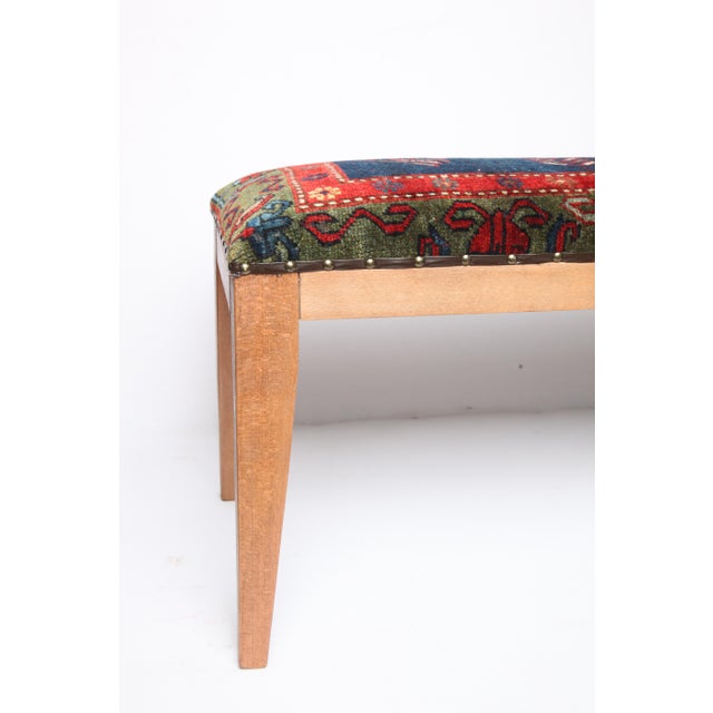 Red Antique Kazak Wool Rug Upholstered Bench, Rustic Tribal Accent Bench With Wooden Legs For Sale - Image 8 of 11