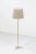 This is a Swedish floor lamp produced sometime around the 1950s. It is made from polished brass with a tripod base. The...