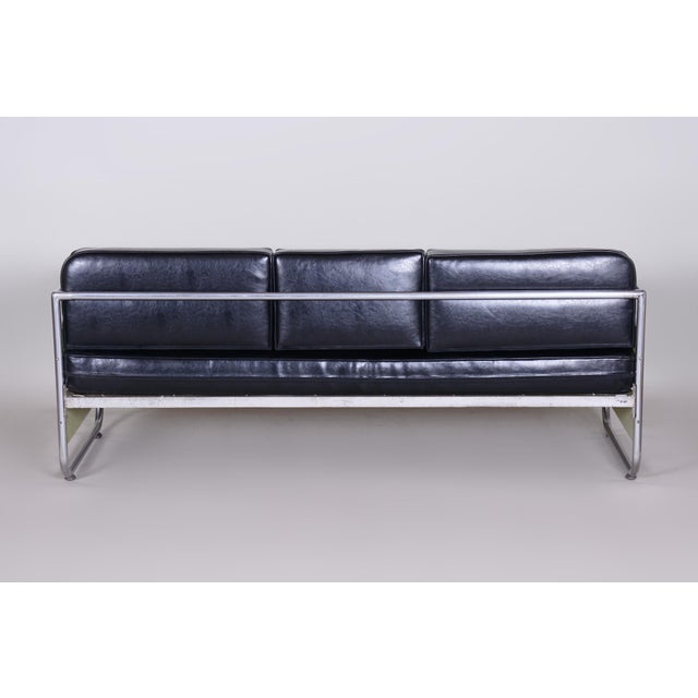This iconic sofa from the 1930s is an exceptional example of Bauhaus design, crafted in Czechoslovakia by the renowned...