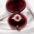 Antique halo ring from the 1900s in 18 carat gold (750 thousandths) and platinum. It is set with a natural ruby ​​of...