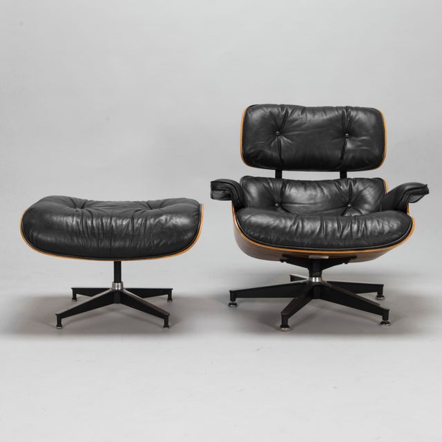 Eames lounge chair and matching ottoman, models 670 and 671, designed by Charles and Ray Eames and produced by Herman...