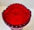 A 1920s flower vase in pressed ryby/deep red glass. Made at Fyens Glasværk (later Holmegaard) in the early 1920s. It's a...