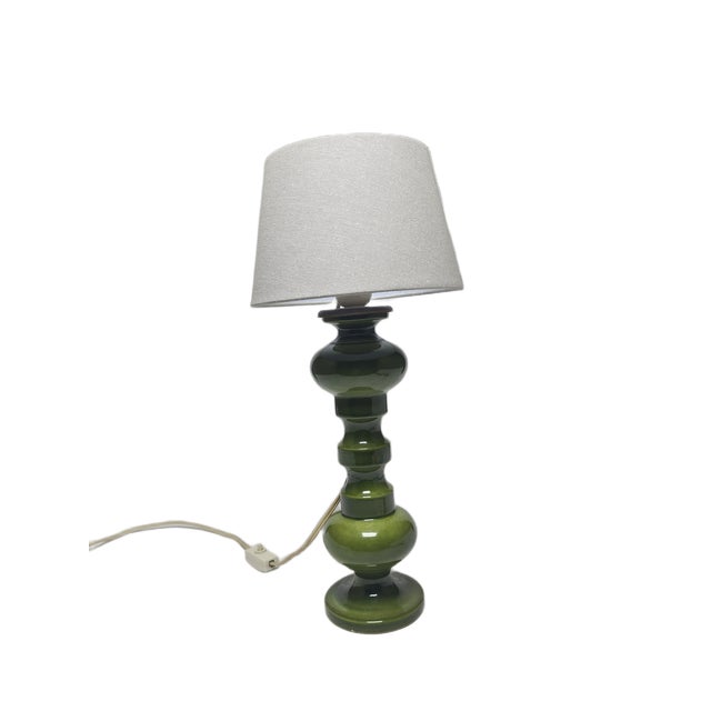 The bedside lamp comes from Polish from the 80s. It has a glass shade and a metal mount. It is preserved in very good...