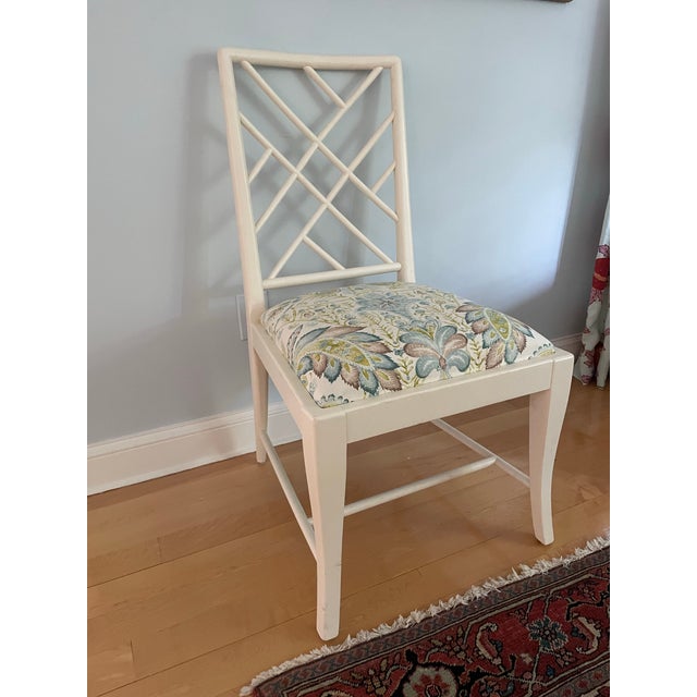 Beautiful white painted Chinese Chippendale lattice back chair. It is upholstered in a Brunschwig & Fils aqua and green...