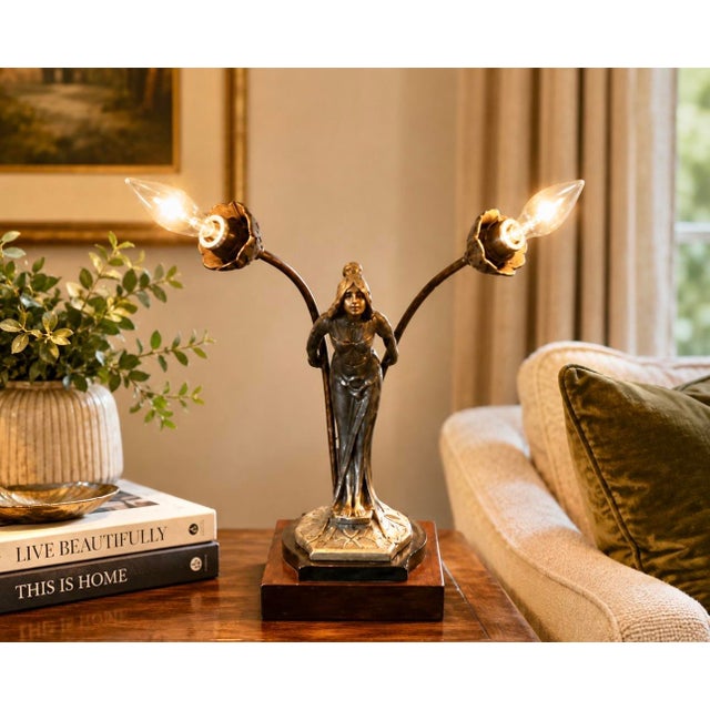 This antique Nouveau figural "Lady" table lamp is a piece of late 19th to early 20th-century significance. It’s aesthetic...