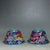 This striking pair of vintage cloisonne enamel tea bowls features a classic flared form with a gilt rim. Each bowl is...