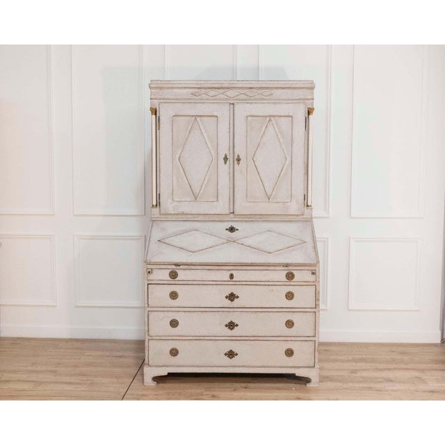 This fine Swedish three-part bureau, dating to circa 1790, is an elegant example of late 18th-century Scandinavian case...