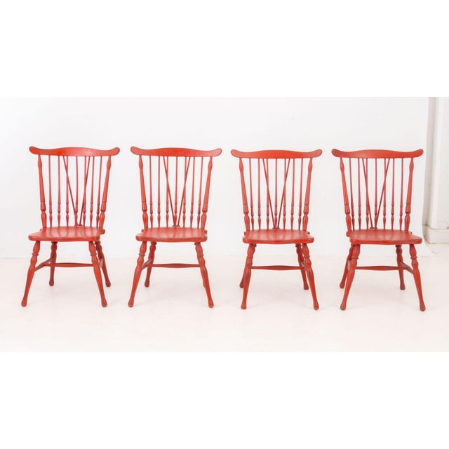 Set of Four Windsor Style Red Painted Dining Chairs, with spindle backs and turned wood legs. 36" H x 16.5" W x 20" D;...