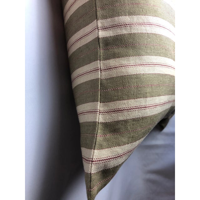 This is a woven stripe fabric in dark khaki, red and natural. They have hidden zipper and matched stripes. These beautiful...
