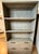 Beautiful bookcase in like new condition. Sturdy and well-made with both drawers and shelves for storage, toys and books....