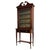 An elegant early 20th-century English display cabinet, finely crafted from walnut and distinguished by its glazed upper...