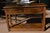 This pine console /hall table, with removable plate rack, has had many years of use! Purchased in the UK. The plate rack...