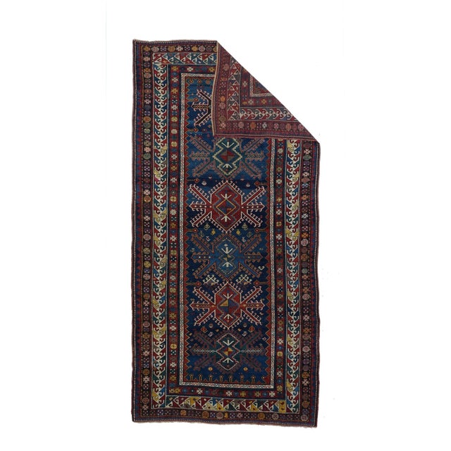 Six aggressively armed and hooked geometric star medallions parade up the royal blue indigo field, in shades of ivory,...