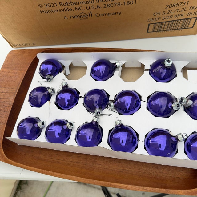 Vintage purple glass ornaments by Rauch. No damages to the ornaments. There is a metal cap on each ornament with the Rauch...