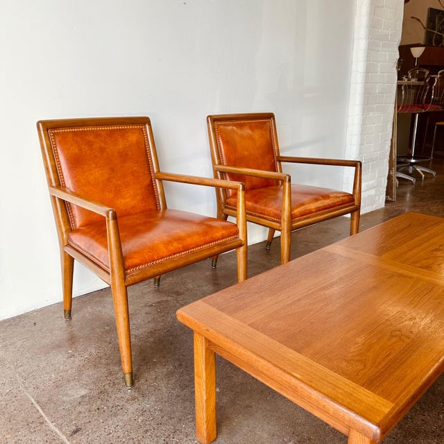 Mid-century arm chairs designed by TH Robsjohn Gibbings for Krug (Canada) circa late 1950s. Made of solid walnut in a...
