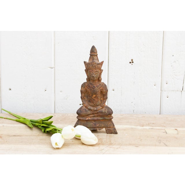 An exquisite antique Buddha statue, a true masterpiece made from bronze. Originating from Northern Thailand, this statue...