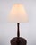 Original standard lamp with integrated table made in mahogany from the 1880s. The lamp is crafted with carved details,...
