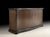 Handcrafted in Italy from solid European beech wood, this credenza features a graceful serpentine front and a light...