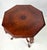 Beautiful Rococo Revival octagonal accent table crafted in rich walnut with book-matched burl wood veneering. The...