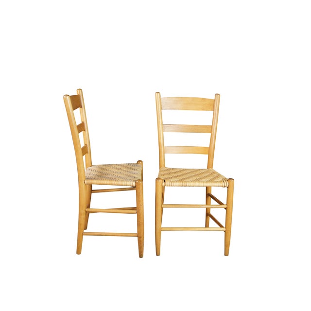 Set of 6 antique Shaker style country farmhouse dining chairs. Made of Maple featuring a woven rattan seat and ladder back...