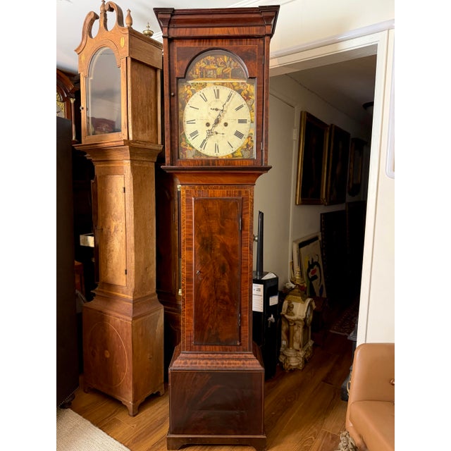 This listing is for an antique grandfather clock. This clock is of Scottish origin and dates to the early 19th century. It...