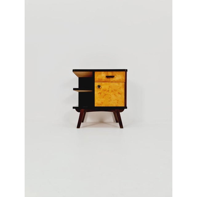 German mid-century beech and teak nightstand/bedside table by WK Möbel, 1960s. It is in good vintage condition; however,...