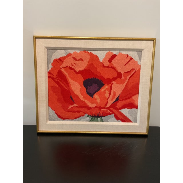 Beautifully stitched vintage needlepoint. The large poppy is done in rich shades of salmon, orange and vivid burnt orange...
