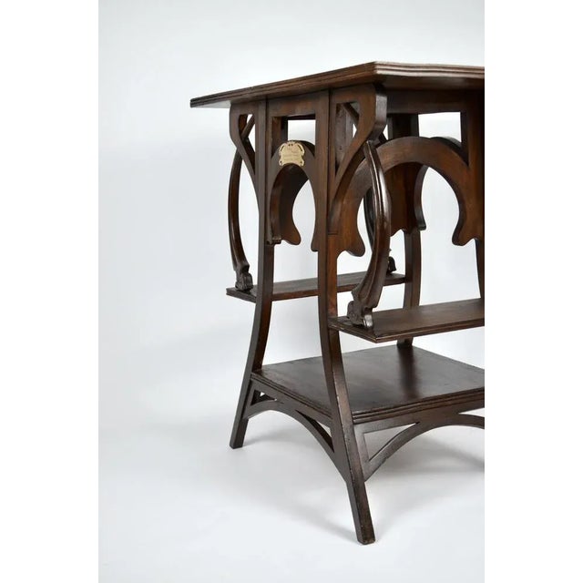 Elegant console table in pure Art Nouveau style, 1910’s Has a brass plaque indicating the manufacturer: "Lusitana...