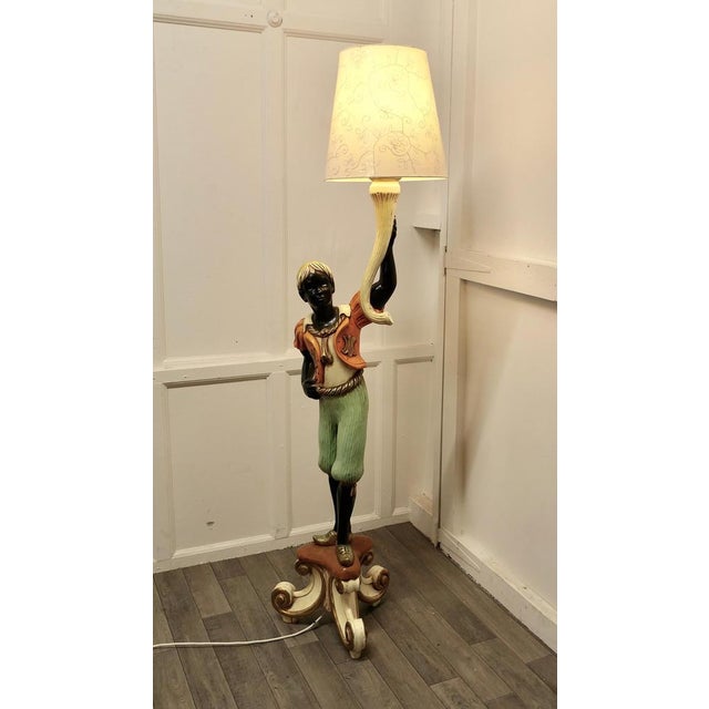 Magnificent Venetian figural floor lamp candelabra. A Charming 5ft tall Italian carved wooden lamp. The Lamp is carved in...