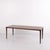Rectangular rosewood coffee table from Danish furniture production in the 1960s. The table features a simple tabletop,...