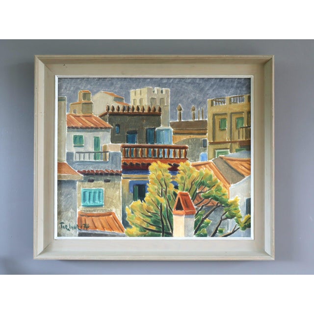 SUNLIT TERRACES Size: 18.7 x 21.9 inches (including frame) Oil on canvas A charming painting that captures a clustered...