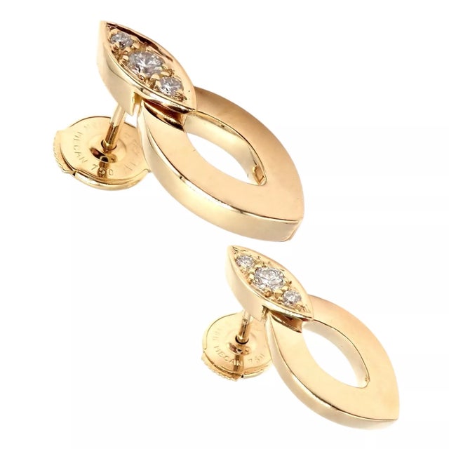 Cartier Diadea set featuring a link bracelet and matching earrings, crafted in 18K yellow gold and Diamonds. Details:...