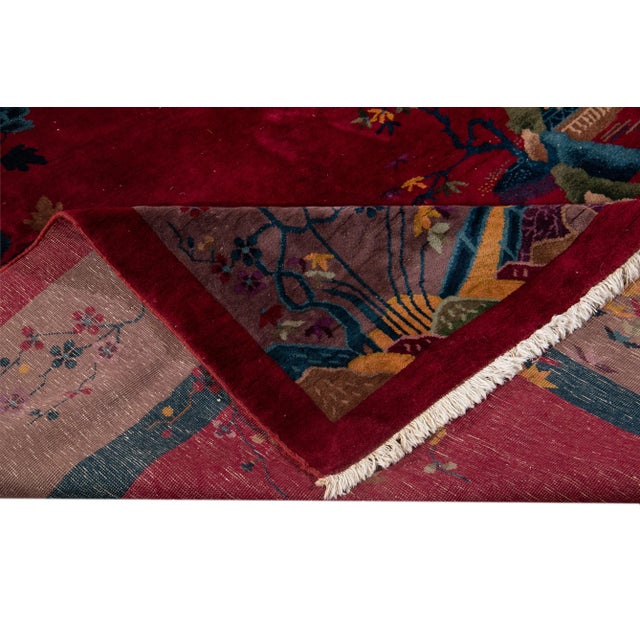 Beautiful Antique Chinese Art Deco Rug, hand-knotted wool with a cherry red field, light pink frame in an allover Classic...