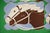 Sz: 13 1/4"H x 19"W Striking vintage placemats set featuring white and brown horse with a blue background. All hand...