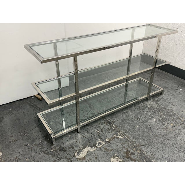 Design Plus Gallery presents the Tribeca Console Table from Williams-Sonoma. The console has a a bold design with a 1-inch...