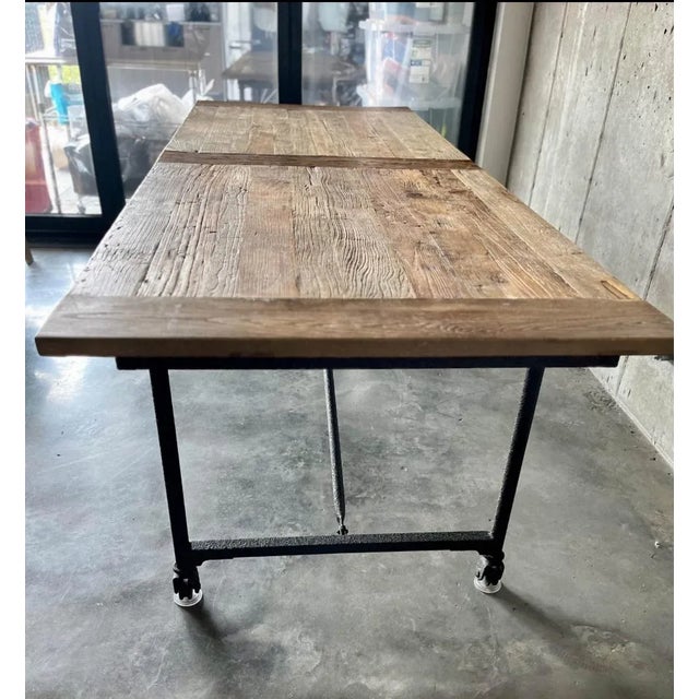 Heavy solid vintage wood and cast iron table from the retired RH fine craftsmanship collection. 92” long and 39” wide....