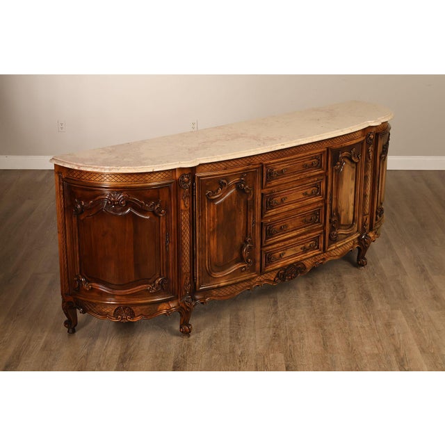 High Quality European Made French Provincial Style Sideboard Featuring A Shaped Marble Top Over A Serpentine Case....