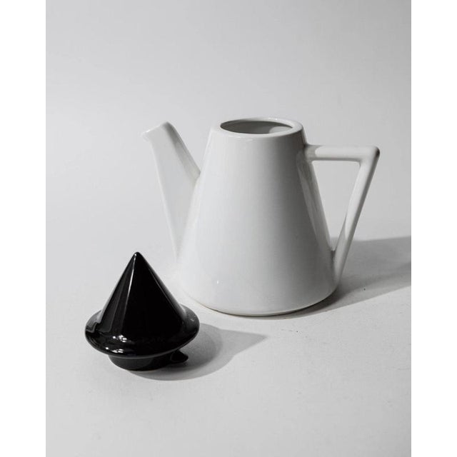 This vintage ceramic coffee or tea pot from the 1980s is a striking example of Postmodern design. The sculptural...