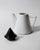 This vintage ceramic coffee or tea pot from the 1980s is a striking example of Postmodern design. The sculptural...