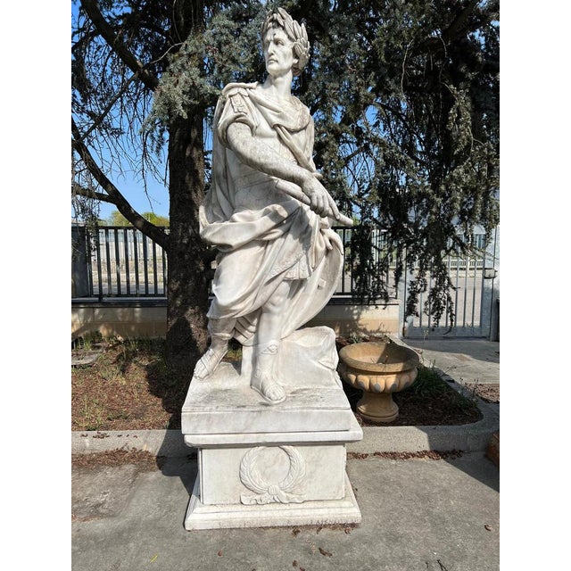 Magnificent full-length sculpture of Julius Caesar, carved in veined white marble in Italy during the 1980s, after the...