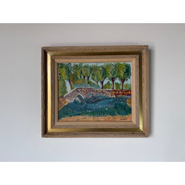 A charming 1960's Impressionist landscape oil painting by I. Malvin, depicting a tranquil park scene with a rustic stone...