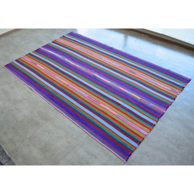 Vintage Turkish handmade Kilim rug - a wool on wool Turkish Kilim rug that is in used condition. Size: 66" x 102" Origin:...