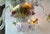 Original retail $13,112, elegant Italian Venetian Glass Flower Chandelier, showroom floor sample