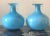 A stunning vintage pair of blue vases. In the style of Murano these beauties are hand blown and handcrafted. Beautiful...