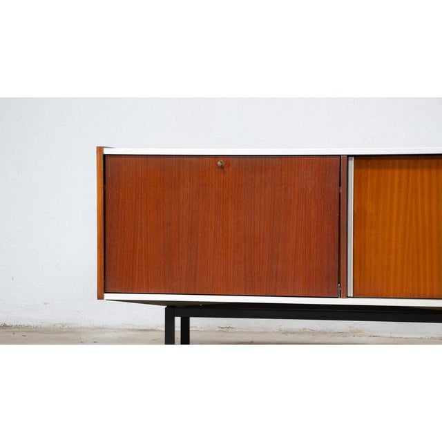 Georges frydman sideboard, efa edition a large mahogany and aluminum sideboard from the 1960s by designer georges frydman,...