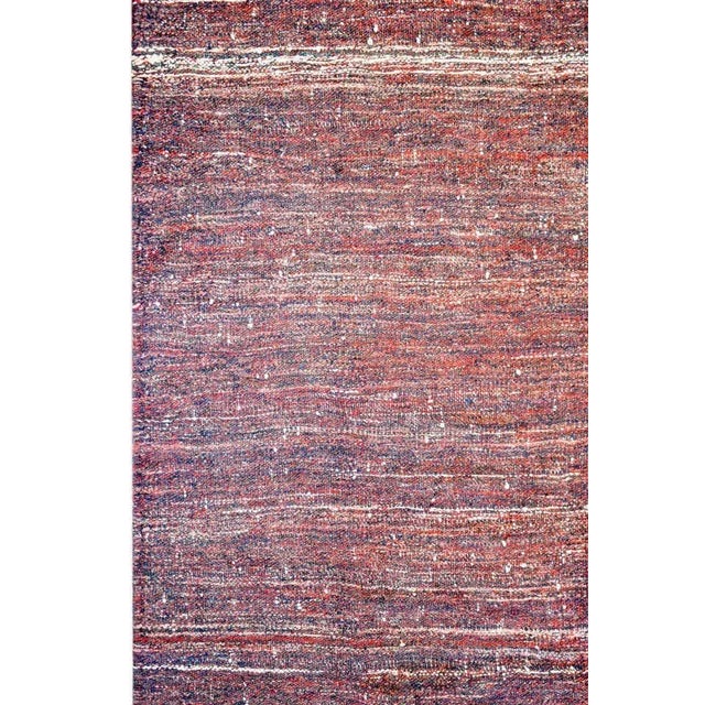 A brilliant vintage Persian Gabbeh Kilim rug woven in crimson and indigo wool with a simple whipstitched edge trim.