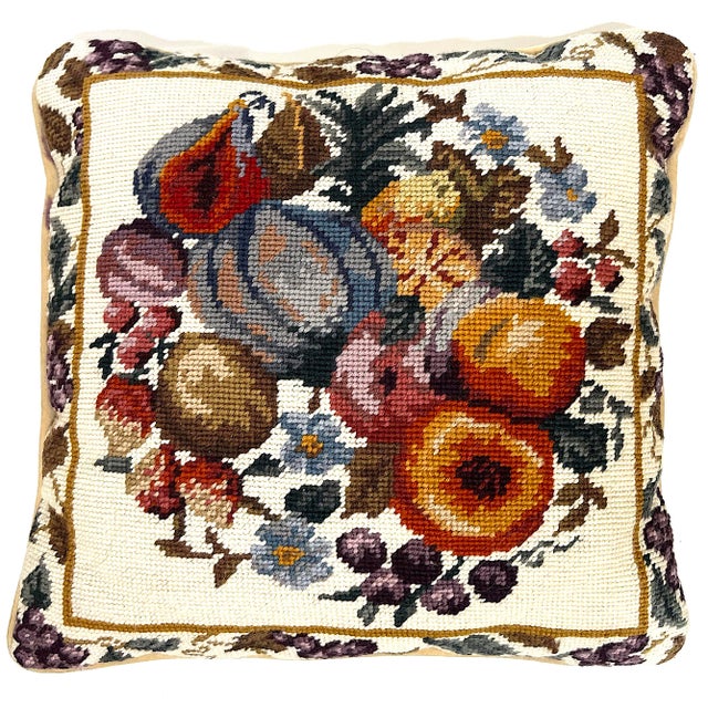 Lovely pair of hand-done needlepoint pillows with fruit vignettes. Each different .with matching borders. Both feature...