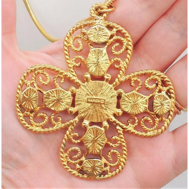 This is part of Chairish’s Costume Jewelry assortment. Goldtone cabochon light blue, pink and green rhinestones filigree...