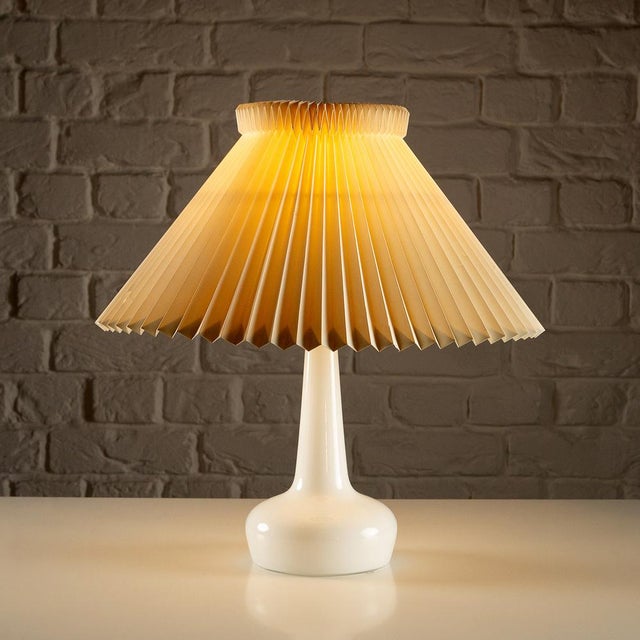 White glass Le Klint Model 311 table lamp by Holmegaard, Denmark, 1960s. Designed by Esben Klint, Denmark in 1949....